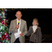 Peter and Jan Peitz tell their story in front of the Christmas tree.