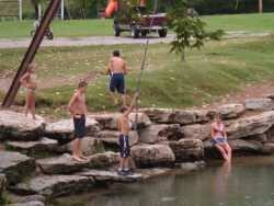 Big Spring Park swimming hole with kids jumping in