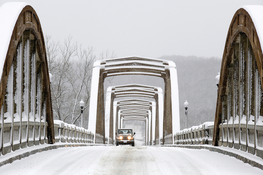 Cotter bridge covered in snow