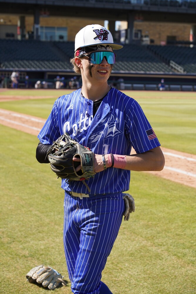 Devin playing baseball