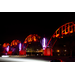 Cotter Bridge illuminates the night with its different colors. 