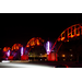 Cotter Bridge illuminates the night with its different colors.