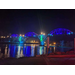 Cotter Bridge lit up in blue and teal tone; photo by Mark Clark