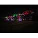 Cotter Bridge lit in green and red lights; photo by R Dennis Dorsey